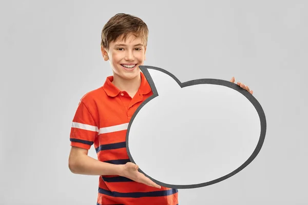 Хлопчик тримає мовну бульбашку — стокове фото