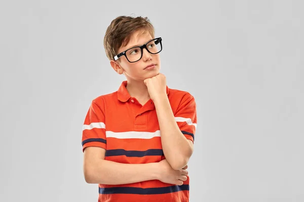 Portrait of thinking boy in eyeglasses — Stock Photo, Image