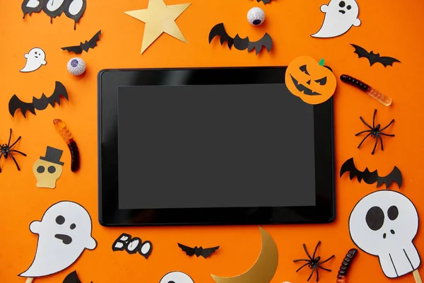 Tablet pc, halloween party props and decorations — Stock Photo, Image