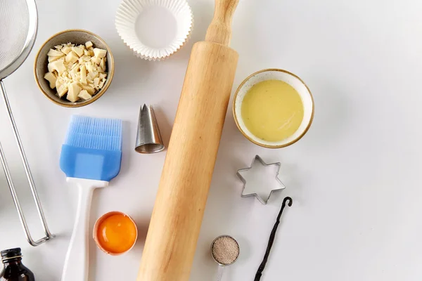 cooking ingredients and kitchen tools for baking