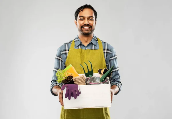 Indian gardener or farmer with box of garden tools — Stock Photo, Image