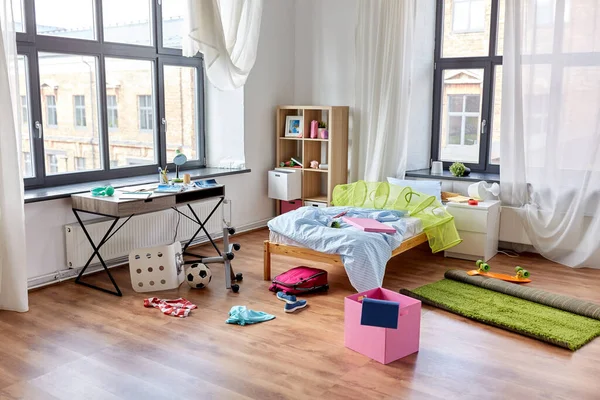 Messy home or kids room with scattered stuff Royalty Free Stock Photos