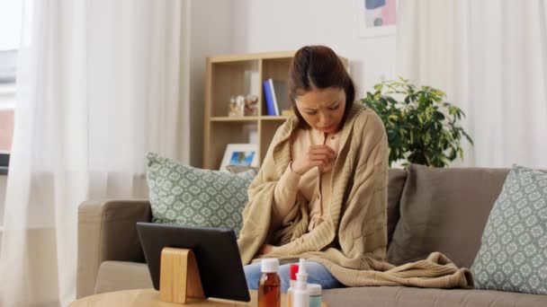 Sick woman having video call on tablet computer — Stock Video