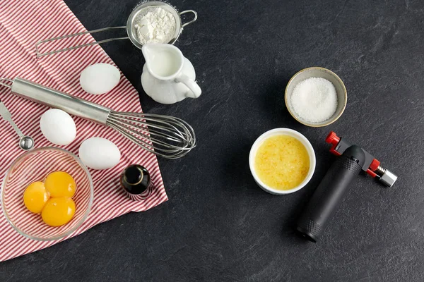 Ingredients and tools for food cooking on table — Stock Photo, Image