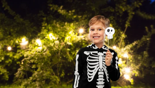 Boy in halloween costume of skeleton making faces — Stock Photo, Image