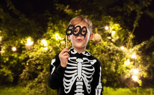 Boy in halloween costume of skeleton making faces — Stock Photo, Image