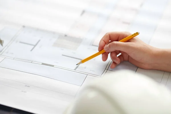 Architect with blueprint working at office — Stock Photo, Image