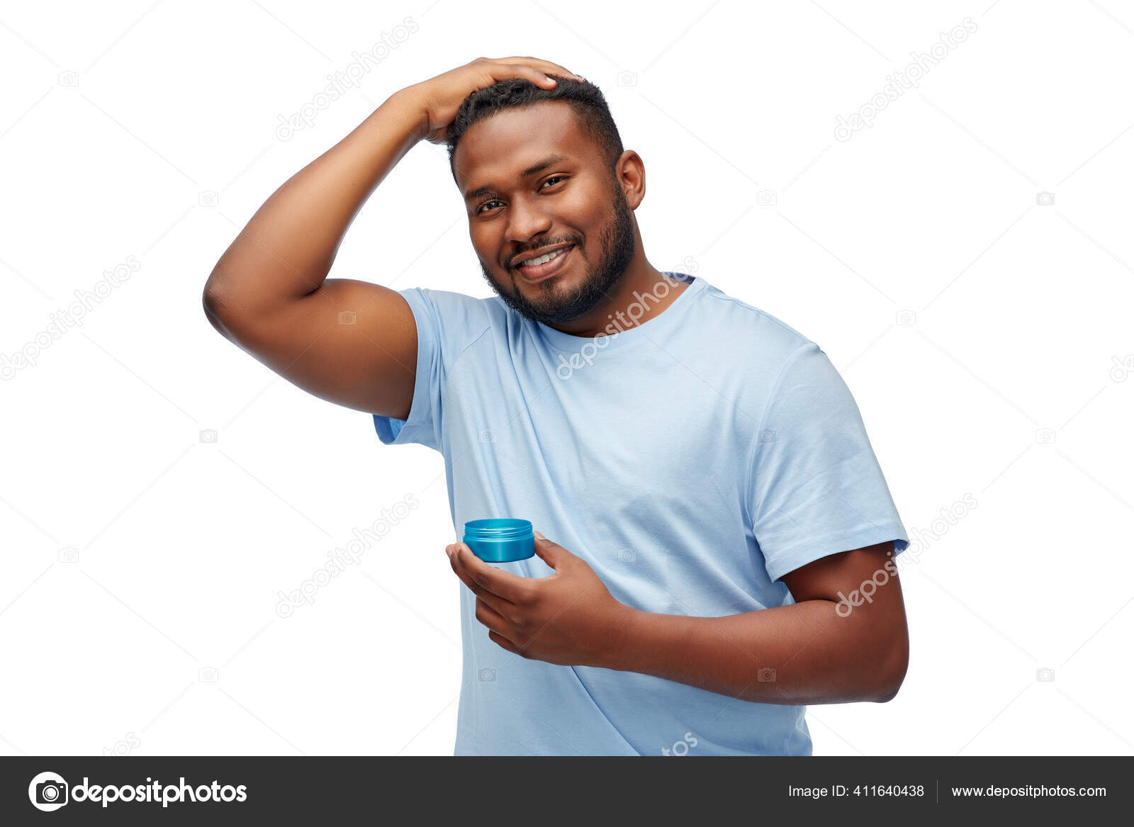 African american man applying hair styling wax Stock Photo by ©Syda_Productions 411640438 African american man applying hair styling wax Stock Photo by ©Syda_Productions 411640438
