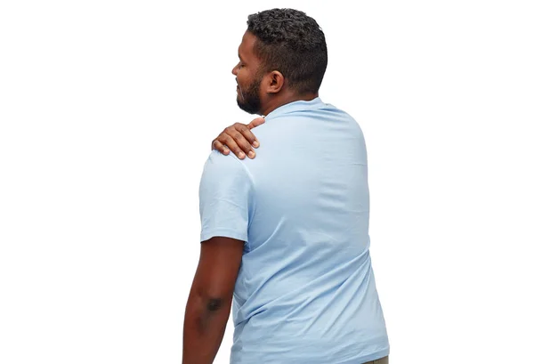 Afrikaans-Amerikaanse man die lijdt aan schouderpijn — Stockfoto