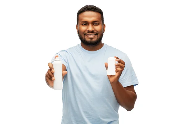 African american man with antiperspirant deodorant — Stock Photo, Image