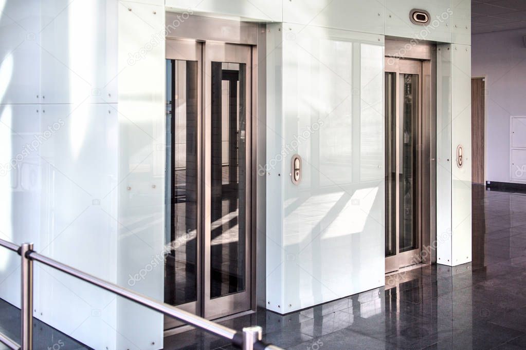 Modern glass doors of elevator in a modern building