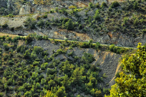 Serpentine road in the mountains of croatia in summer — Stock Photo, Image