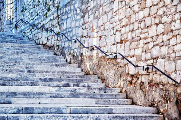 Ancient stone staircase, detail of architecture in the city.