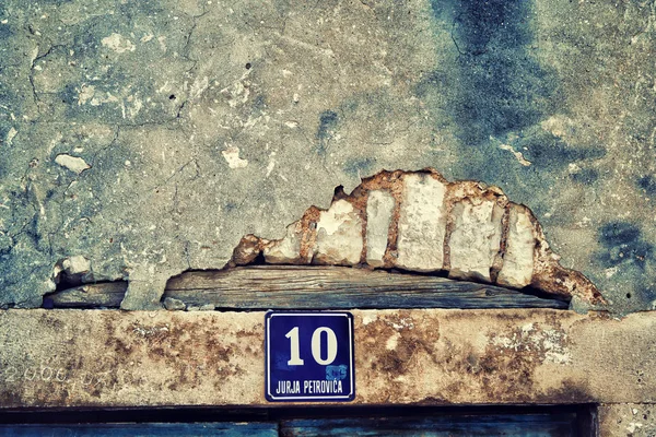 Destroyed plaster wall or cement brick wall texture — Stock Photo, Image