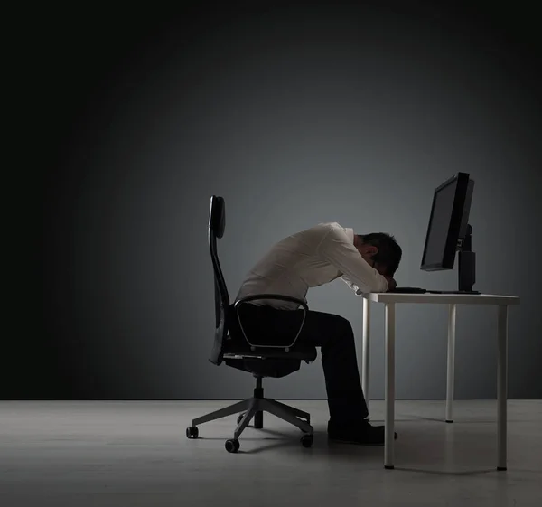 Tired businessman having a nap - isolated Stock Picture