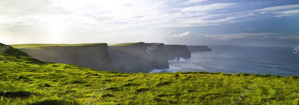 Cliffs of Moher Burren, green grass, morming, County Clare, Irel