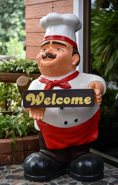 Chef model with welcome signage sculpture