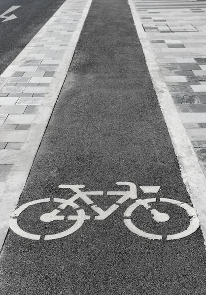 Bike lane symbol on ground, Bangkok, Thailand