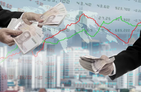 Trader investing in stock market with graph and cityscape backgr — Stock Photo, Image