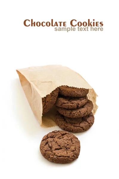 Biscuits au chocolat avec des fissures sur le fond blanc, vue de dessus — Photo