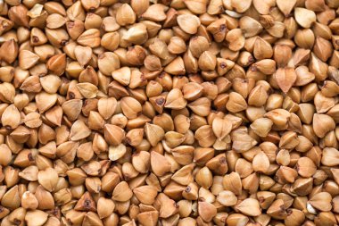 Karanlık Ham buğday doku yüksek kaliteli fotoğraf premium karabuğday kabuğu çıkarılmış tane