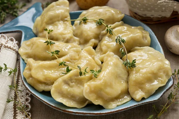 Dumplings with potatoes and mushrooms. This is a very popular food in Eastern European countries, in Poland, Ukraine and Russia. Homemade food