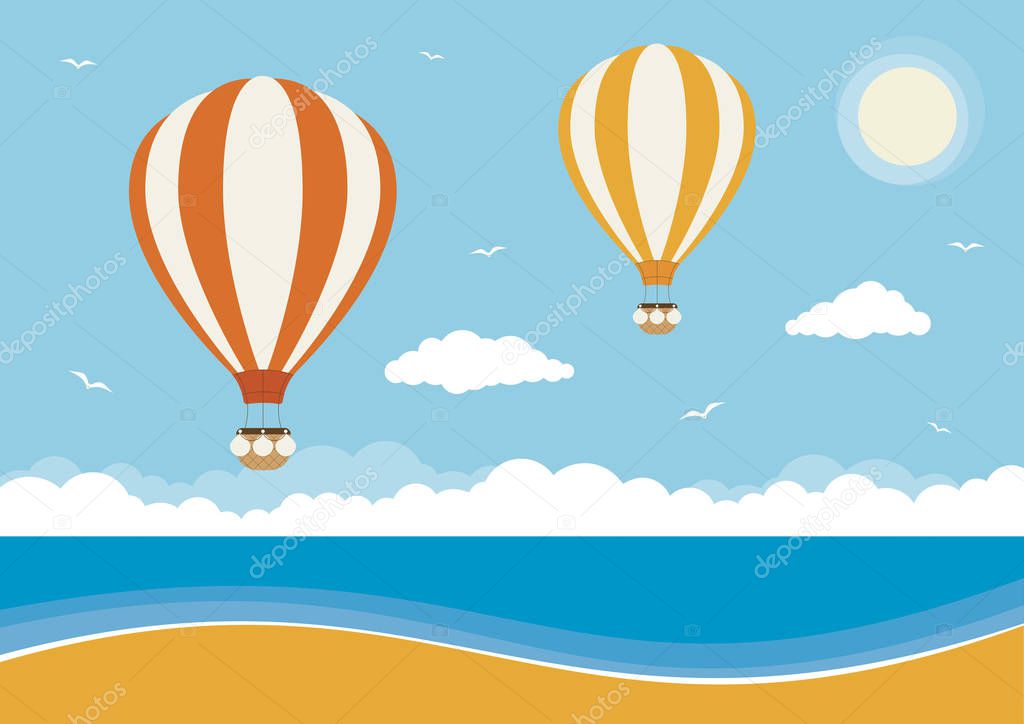 Hot air balloons flying over a beach