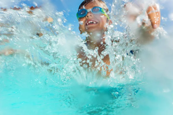 Portrait Happy Boy Wearing Goggles Having Fun Splashing Water Swimming — Stock Photo, Image