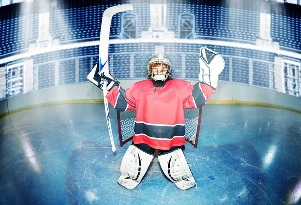 Portrait Happy Boy Young Goaltender Raising Hockey Stick Overhead Celebrating — Stock Photo, Image