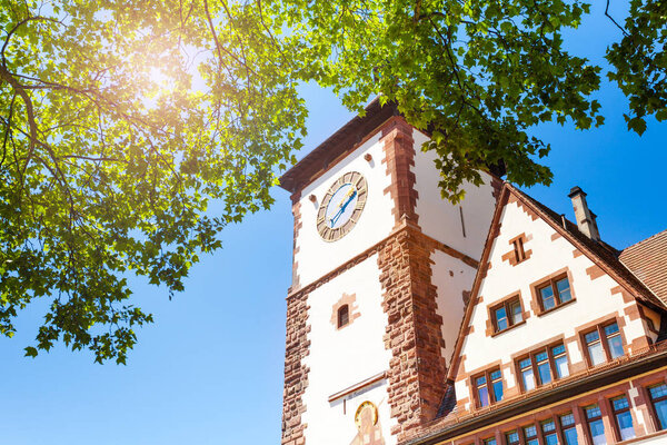 Low-angle view of medieval Schwabentor gate tower in Freiburg, Germany