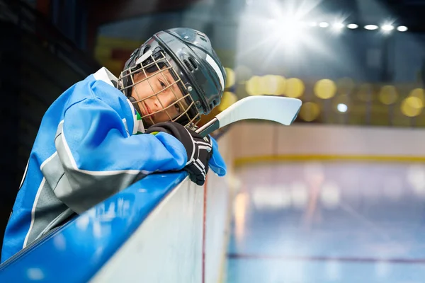 Teenage Hockey Player Uniform Leans Boards Ice Rink Watches Game — Stock Photo, Image