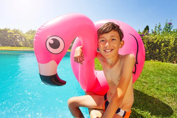 Portrait Happy Teenage Boy Flamingo Inflatable Ring Relaxing Swimming Pool — Stock Photo, Image