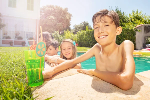 Portrait Happy Boy Drinking Cocktail While Relaxing Outdoor Swimming Pool — Stock Photo, Image