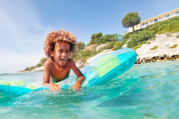 Portrait Cute African Boy Riding Inflatable Mattress Sea — Stock Photo, Image