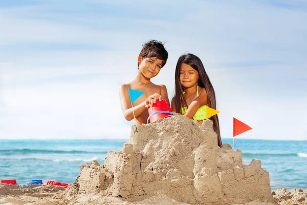 Portrait Happy Kids Siblings Building Sandcastle Beach Smiling Looking Camera — Stock Photo, Image