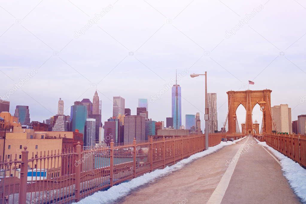 Pedestrian walkway on a upper deck of Brooklyn bridge in winter, New York City, USA