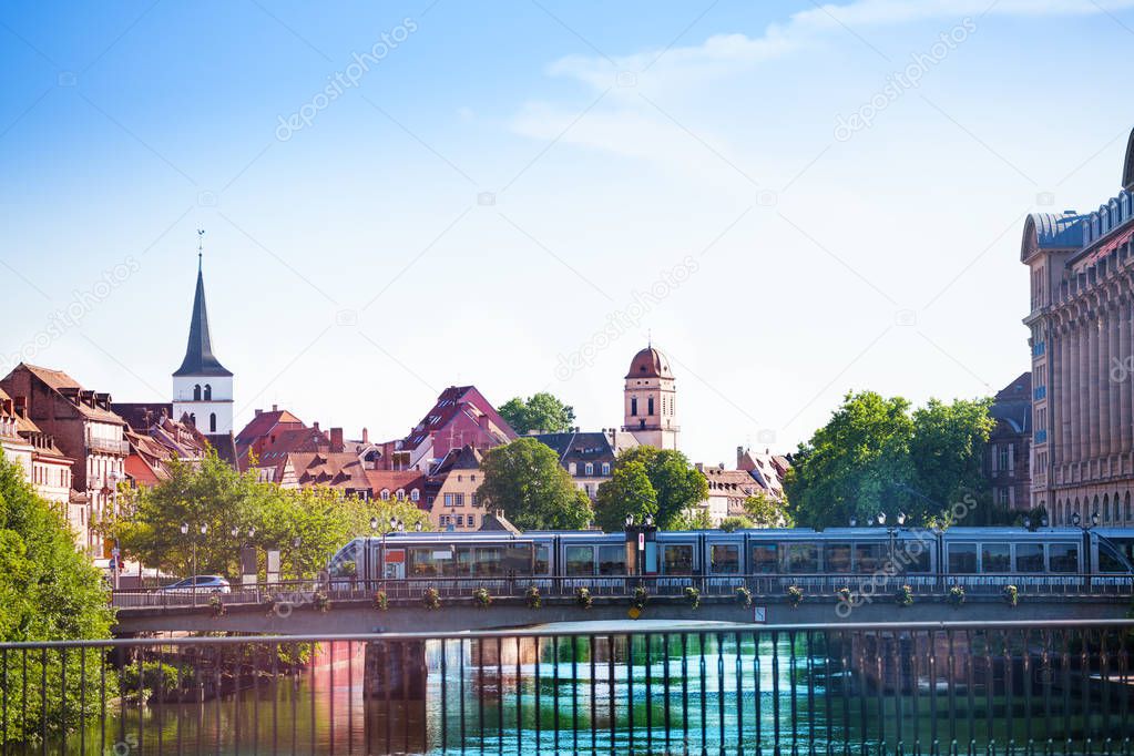 Beautiful cityscape of Strasbourg with Saint William's and Sainte-Madeleine churches bell towers on the distance