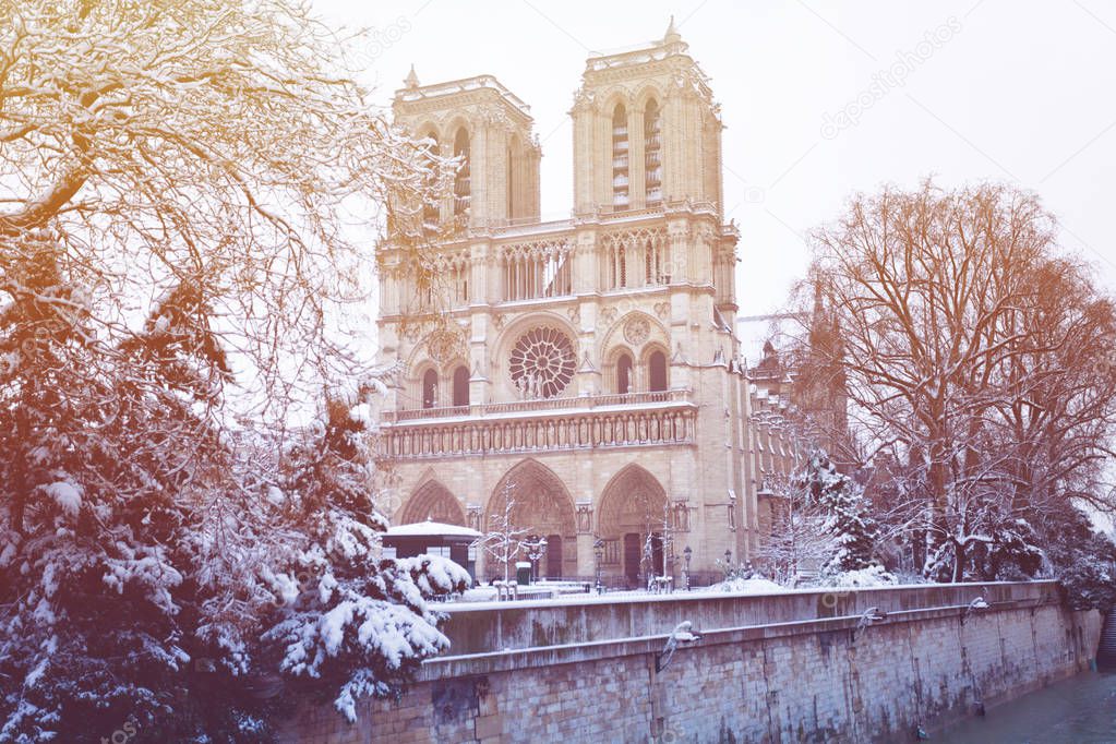 Beautiful view of Notre-Dame Cathedral after snowfall in Paris, France