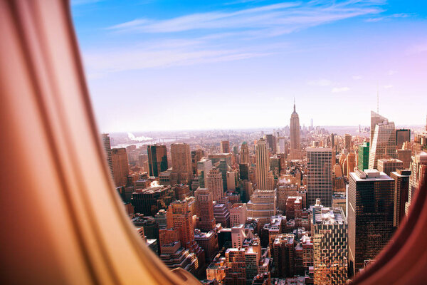 New York city panorama view from plane window illuminator during flight
