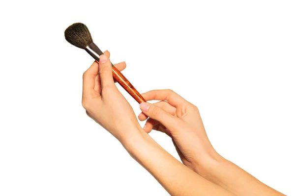 Imagen Cerca Manos Femeninas Sosteniendo Pincel Polvo Maquillaje Aislado Sobre — Foto de Stock