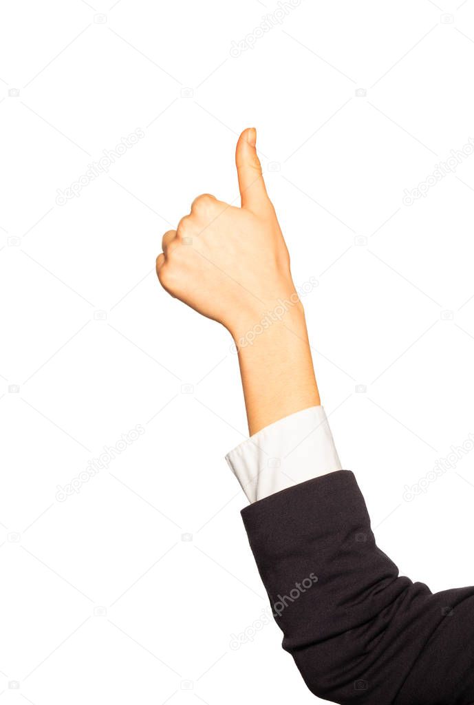 Female hand in business suit giving thumbs up gesture, isolated on white