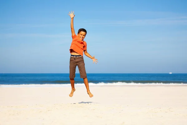 Photo Happy Little Handsome Boy Jump High White Sand Beach — Stock Photo, Image