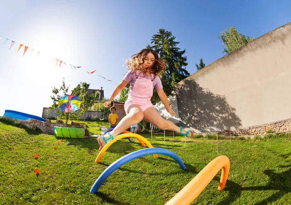 Cute Happy Beautiful Long Hair Girl Jump Obstacle Course Barriers — Stock Photo, Image