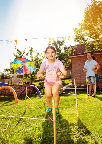Portrait Girl Pink Jumping Strings Game Passing Line Obstacles Competing — Stock Photo, Image
