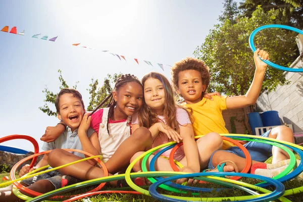 Group Happy Laughing Diverse Kids Sit Together Hoops Color Circles — Stock Photo, Image