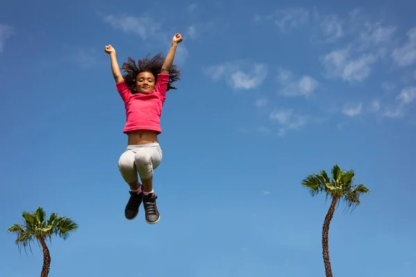 Happy Little Girl Curly Hair Jump Blue Sky Higher Palms — Stock Photo, Image
