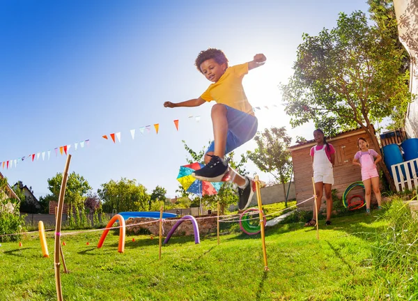 Cute Black Curly Hair Boy Jump Strings Passing Course Obstacles — Stock Photo, Image