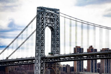Close view of George Washington Bridge in New York over overcast sky