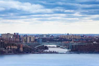 View of Henry Hudson Bridge and Bronx over river from Englewood Cliffs