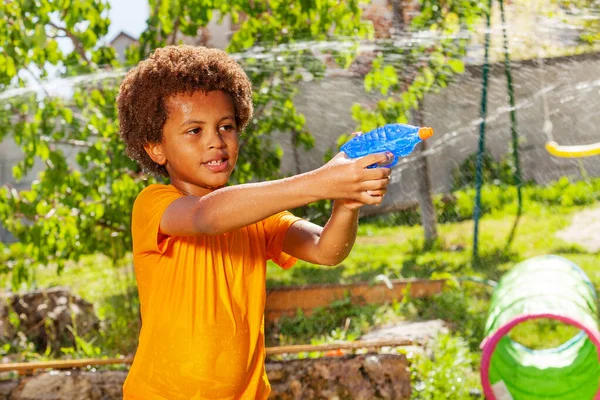 Handsome Black Boy Shooting Water Gun Playing Active Game Garden — Stock Photo, Image